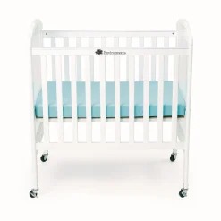 Environments® White Compact Adjustable Clear View Crib with Mattress